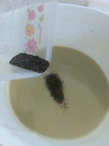 Adding tea leaves