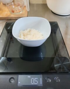 Weighing Coconut Milk to Make Soap