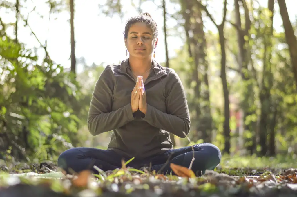Woman Meditating - Self Care on the Level Up Journey