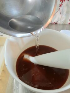 Adding Lye Solution to Sandalwood in Oils