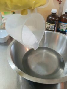 Adding sodium hydroxide to water